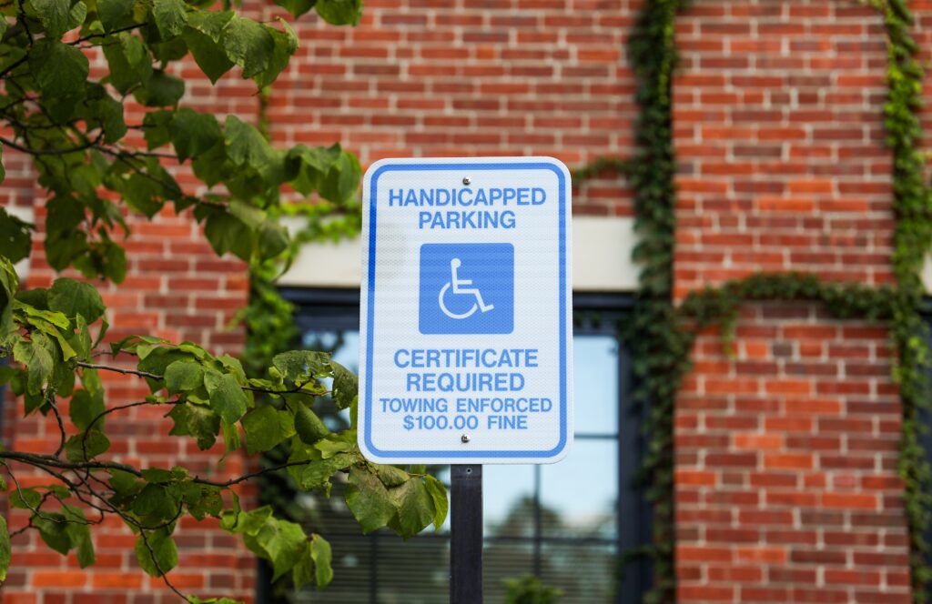 Wheelchair,Accessibility,Sign,Against,A,Modern,Cityscape,,Conveying,Equality,And