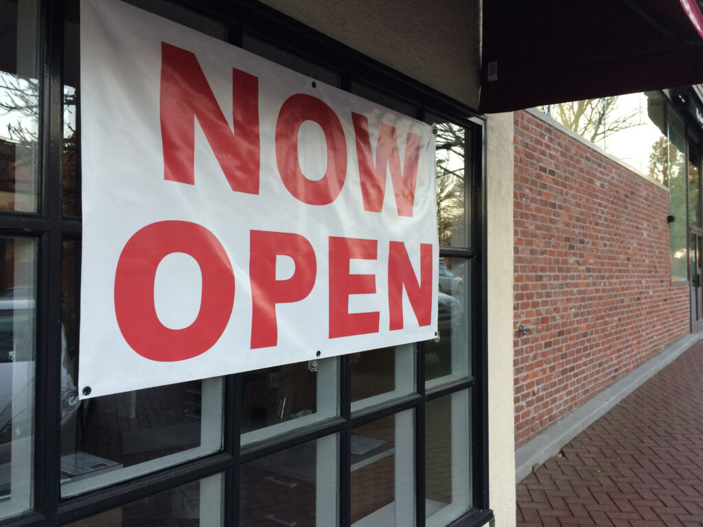 The,New,Store,Hangging,The,Red,Font,On,The,White