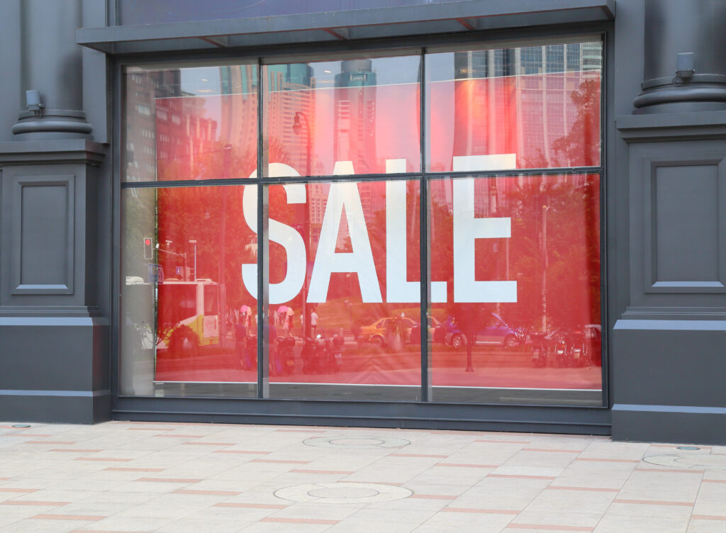 Sale,Sign,On,Store,Window